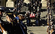 Honor guards carry the casket of former President Gerald R. Ford out of the United States Capitol Building in Washington, D.C., January 2, 2007 en route to Washington's National Cathedral for a funeral service.
