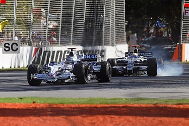 Rosberg and Heidfeld both racing each other at the 2008 Australian Grand Prix