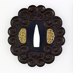 Japanese tsuba with geometric scrollwork design, not imitating plant forms, unknown date, shakudo and gold, Walters Art Museum, Baltimore, US