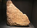 Fragment with the name of the theatre's benefactor, the rich merchant Orgétorix, shelly limestone. Archeological museum in Jublains[39]