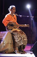 Sumba, Indonesia. Kahi Ata Ratu performing on the Junga. Originally a boat lute, this type was modeled after a Portuguese instrument.