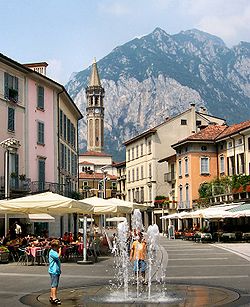 Piazza XX Settembre, in the centre of the town, and the San Martino mountain