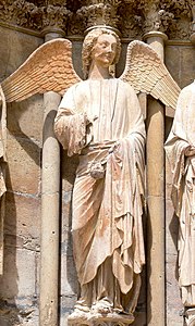The High Gothic - Smiling Angel, north portal of west façade of Reims Cathedral, by the St. Joseph Master. (1240)