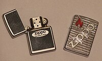 Two Zippo lighters, one open, one closed