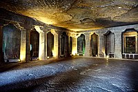A monastery, or vihara, with its square hall surrounded by monks' cells. Ajanta Caves, no. 4