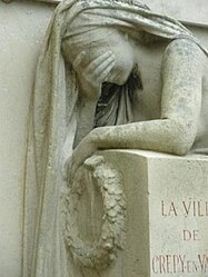 A close-up of a section of the Crépy-en-Valois war memorial