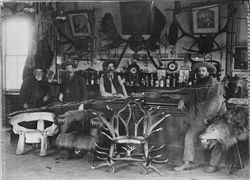 Kinman's bar in Table Bluff in 1889, with three chairs displayed