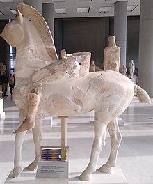 Photograph of a Greek sculpture, showing a man on a horse