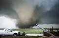 A spectacular tornado, but trucks in foreground could be distracting.