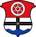 Gemeinde Dorfprozelten Geteilt von Rot und Silber; oben ein sechsspeichiges silbernes Rad, unten ein durchgehendes schwarzes Kreuz; im Schildfuß blaue Wasserwellen.
