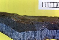 Blue asbestos (crocidolite); the ruler is 1 cm