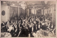 Grayscale print depicting a banquet in honor of composer Arturo Toscanini at the St. Regis Hotel in 1908