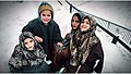 Kashmiri Muslim children wearing Pheran