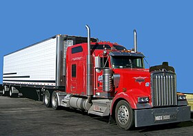 Class 8 Kenworth W900 tractor with spread-axle 48-foot (14.63 m) refrigerated trailer.