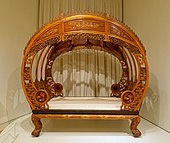 Chinese moon-gate bed; circa 1876; satinwood (huang lu), other Asian woods and ivory; Peabody Essex Museum (Salem, Massachusetts)