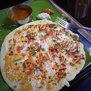 Uthappam or utthapa, a version with onion, chilli and tomato