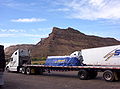 Freightliner Columbia with Flatbed Spread Axle trailer