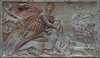 Polychrome tauroctony relief, with Luna driving her ox-drawn biga (right), and the Sun his four-horse chariot (late 3rd century)