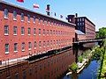 Image 29Textile mills such as the Boott Mills in Lowell made Massachusetts a leader in the US Industrial Revolution. (from History of Massachusetts)
