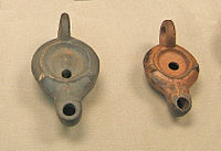 Two Roman Firmalampen. The one on the left was made in Colchester, and that on the right in Gaul. Both were found in Britain