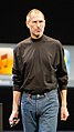 Steve Jobs wearing his signature black mock turtle neck by Issey Miyake[10]
