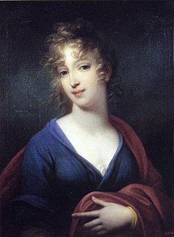 A young woman with dark blonde hair and very pale white skin, wearing a simple blue dress and a red shawl.