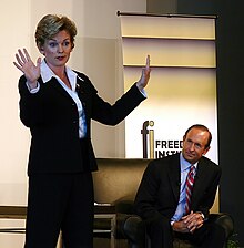 Granholm and Devos at an October 12 informal debate at the Detroit Economic Club