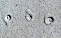 "Rootless Cones" on Mars - due to lava flows interacting with water (MRO, January 4, 2013) (21°57′54″N 197°48′25″E﻿ / ﻿21.965°N 197.807°E﻿ / 21.965; 197.807).