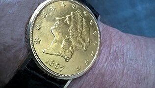 Meisterwerksarbeit - Ebel - Armbanduhr - Sprungdeckeluhr - in echt goldener Zwanzig Dollar Münze von 1897 - der USA
