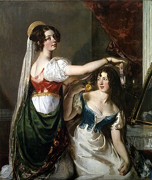 Two young women in elaborate clothing
