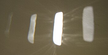 Projektion der Sonne auf einer Zimmerdecke