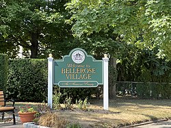 A village welcome sign at the Bellerose station in August 2022.