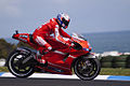 Casey Stoner, riding his 2010 Ducati Desmosedici GP10 in Philip Island, Australia. Note that the alternative "barcode" livery has been removed completely.