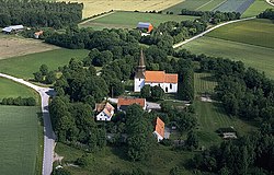 Hogrän Church and the surrounding landscape in central Hogrän