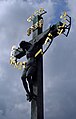 INRI plaque attached to Crucifix and Calvary statue on the north side of Charles Bridge, Prague