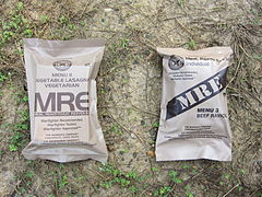 A pair of Meal, Ready-to-Eat (MRE) field rations packaged in retort pouches
