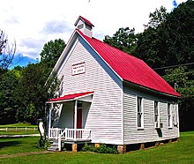 2005 photograph of a preserved wooden one-room schoolhouse in the community of Mineral Springs in Ohio