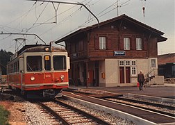 station building with upper floor in different color (undated)