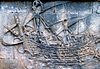 One of the ships in Borobudur depicting a double-outrigger vessel with tanja sails in bas-relief (c. 8th–9th century)