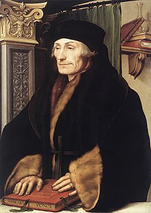 A middle-aged man with a book in his hands wearing a fur coat and a fur hat