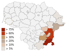 Grafische Karte Litauens mit farbig markierten Anteilen polnischsprachiger Bewohner in jeder Region, die von 5 % bis über 75 % gehen. Die größte Dichte liegt im Südosten.