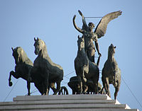 The Quadriga of Unity on the summit of one of the two propylaea