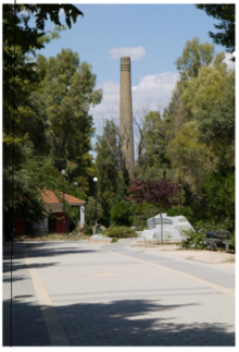 The factory's main chimney, still standing today.