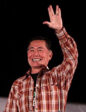 George Takei, a colleague of Nimoy who portrayed the Star Trek character Hikaru Sulu in the original series, salutes a crowd in 2011.