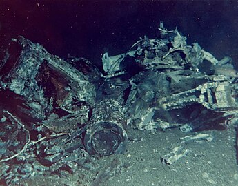 Intact SNAP-19 fuel capsule is shown among debris on Pacific Ocean floor, resulting from the aborted launch of a Nimbus B.