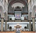 Orgelchor einer neuromanischen Kirche mit Prospekt der 1930er Jahre (St. Mariä Himmelfahrt, Bettemburg LU)