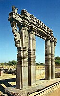 Kakatiya Kala Thoranam (Warangal Gate) built by the Kakatiya dynasty in ruins; one of the many temple complexes destroyed by the Delhi Sultanate.[33]