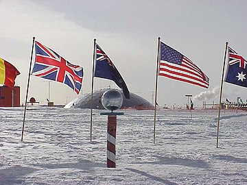 Ceremonial South Pole (the dome in the background was dismantled in 2009–2010).