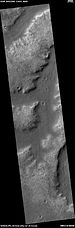 Wide view of a group of channels, as seen by HiRISE under HiWish project. Some parts of the surface show patterned ground when enlarged.