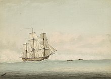 A three-masted wooden ship cresting an ocean swell beneath a cloudy sky. Two small boats tow the ship forward